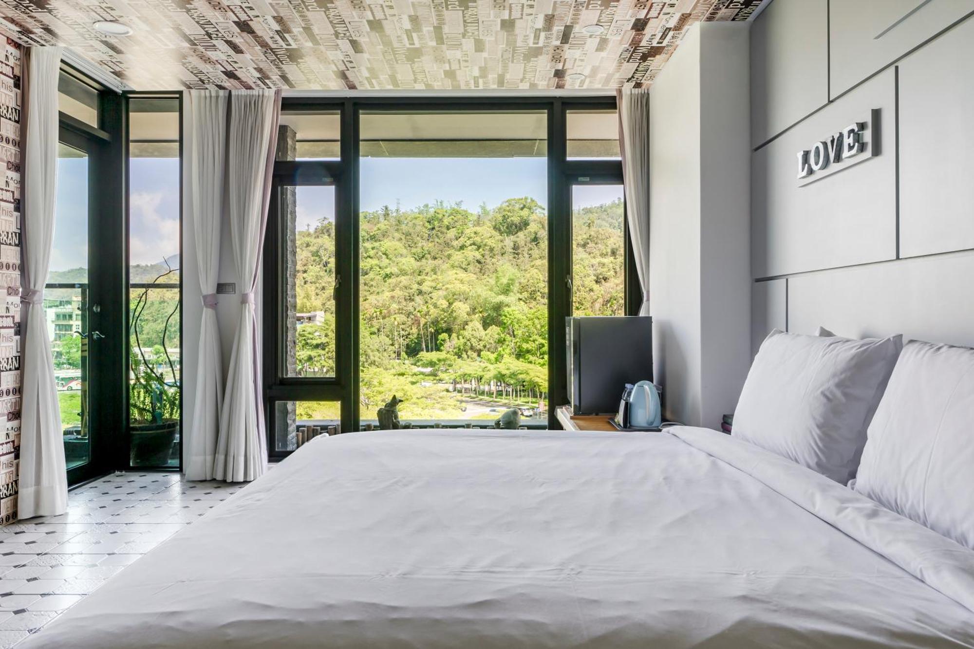 Han Yan Design Hotel Юйчи Экстерьер фото